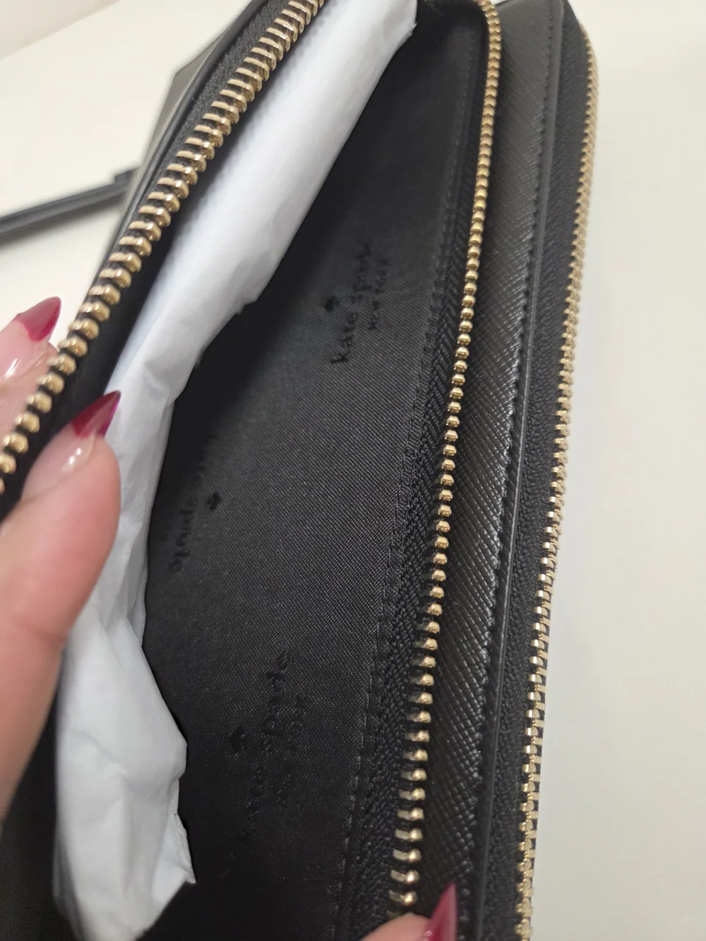 kate spade New York Black Saffiano Wristlet with Gold Logo